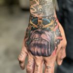 Thanos hand tattoo