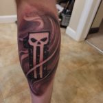 punisher skull tattoo in the number 1